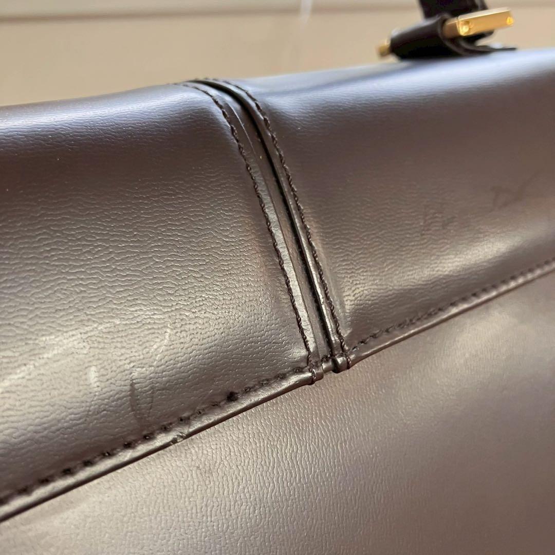 る*る様 未使用　イヴサンローラン　ロゴ金具　ダークブラウン　ハンドバッグ　長期