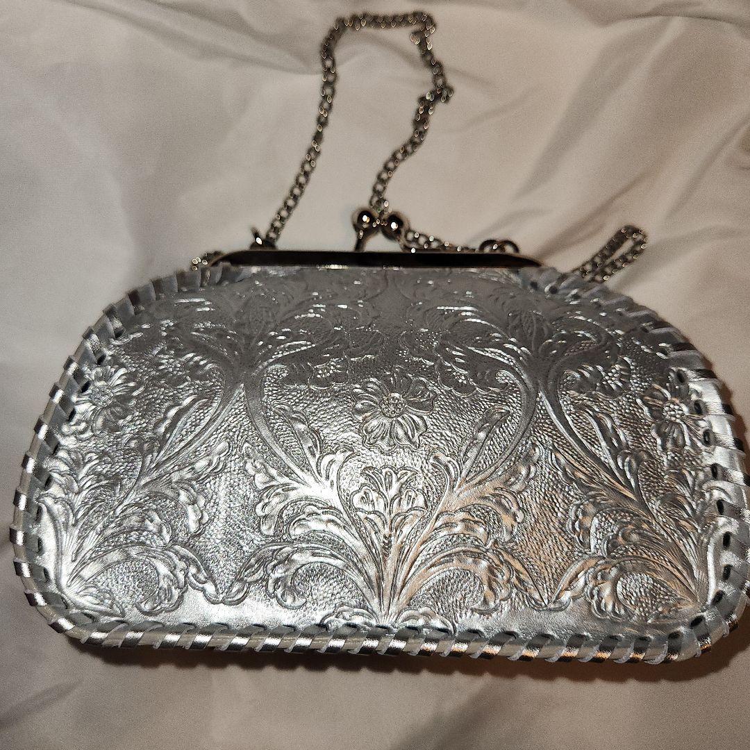 カービングトライブスがま口ショルダーバッグ