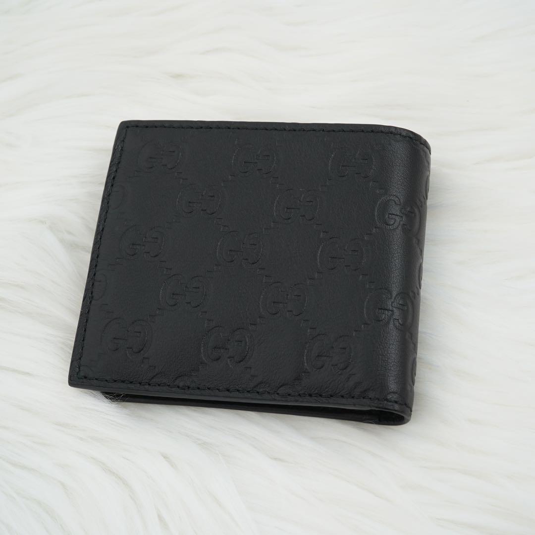 未使用品　箱付き　GUCCI グッチ　二つ折り財布　GG柄　シマ　ブラック