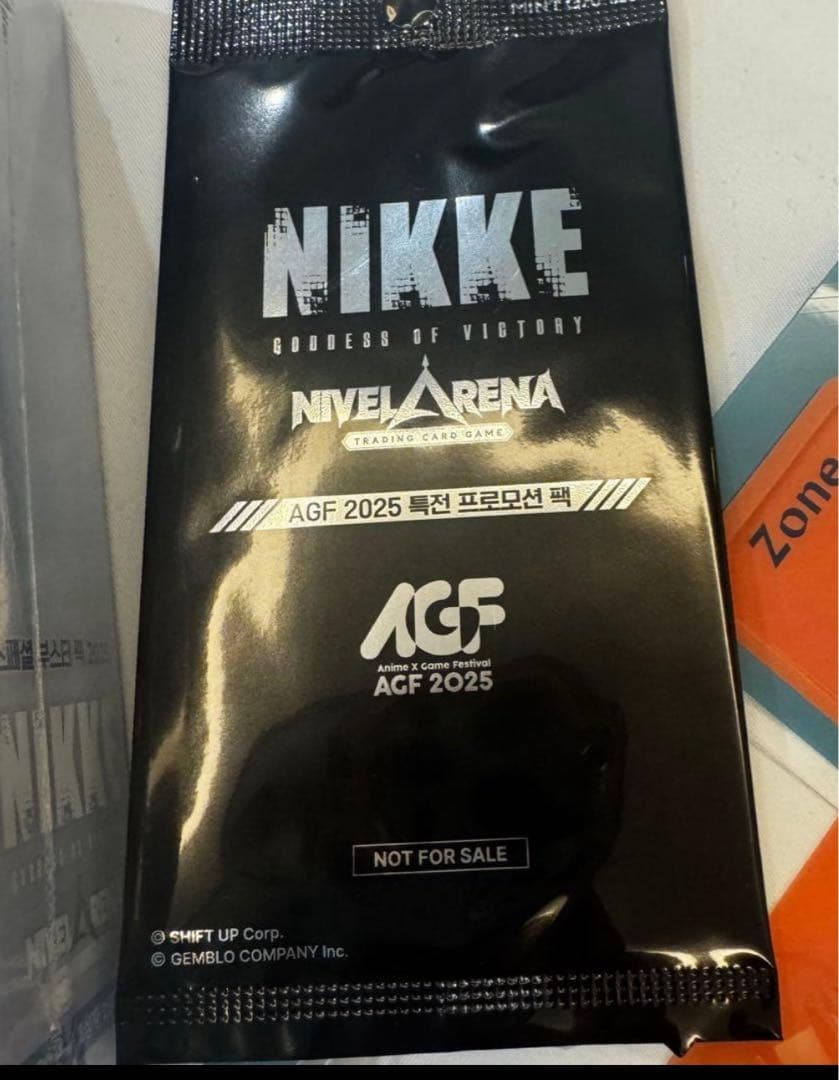 海外限定】勝利の女神NIKKE ニベルアリーナ カードゲーム 2BOX おまけ付