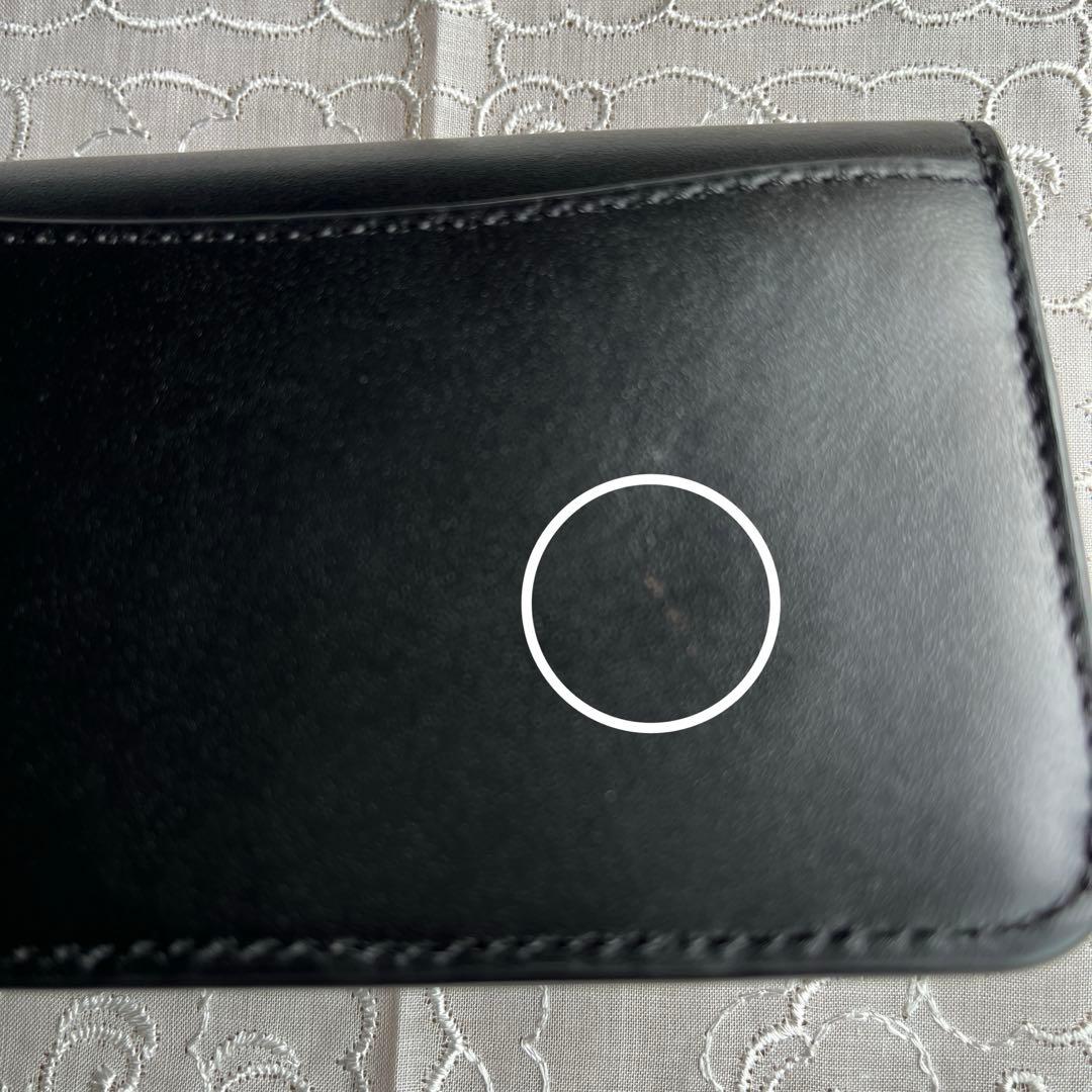 COACH 二つ折りミニ財布