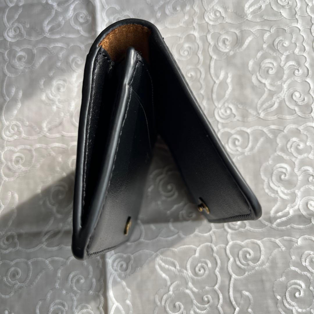 COACH 二つ折りミニ財布