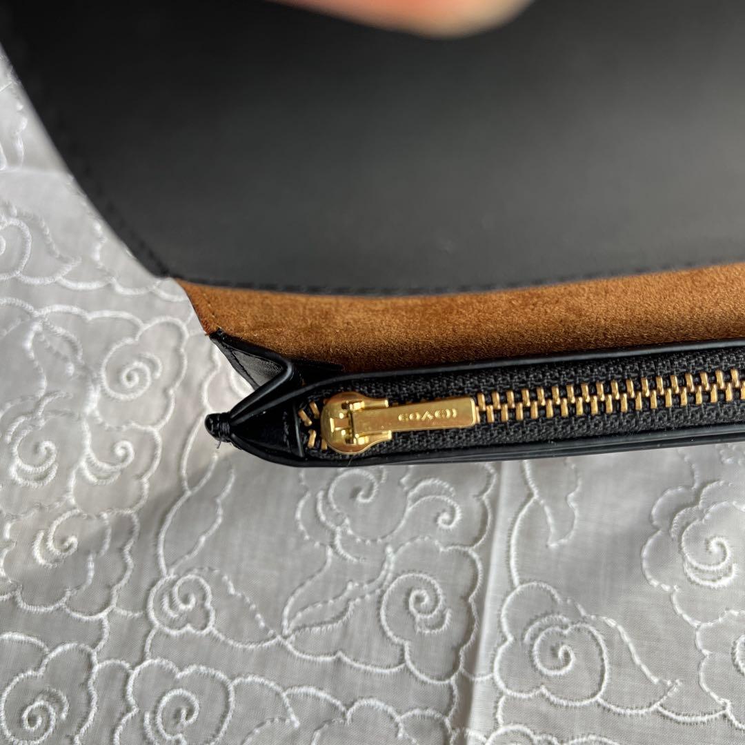 COACH 二つ折りミニ財布