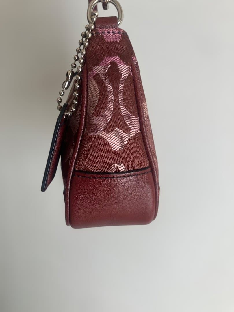 コーチ　アクセサリーポーチ　ミニバッグ　シグネチャー7027