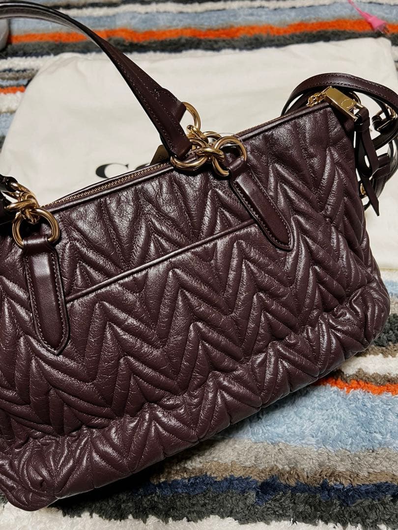 COACH ダークボルドー エコ配希望