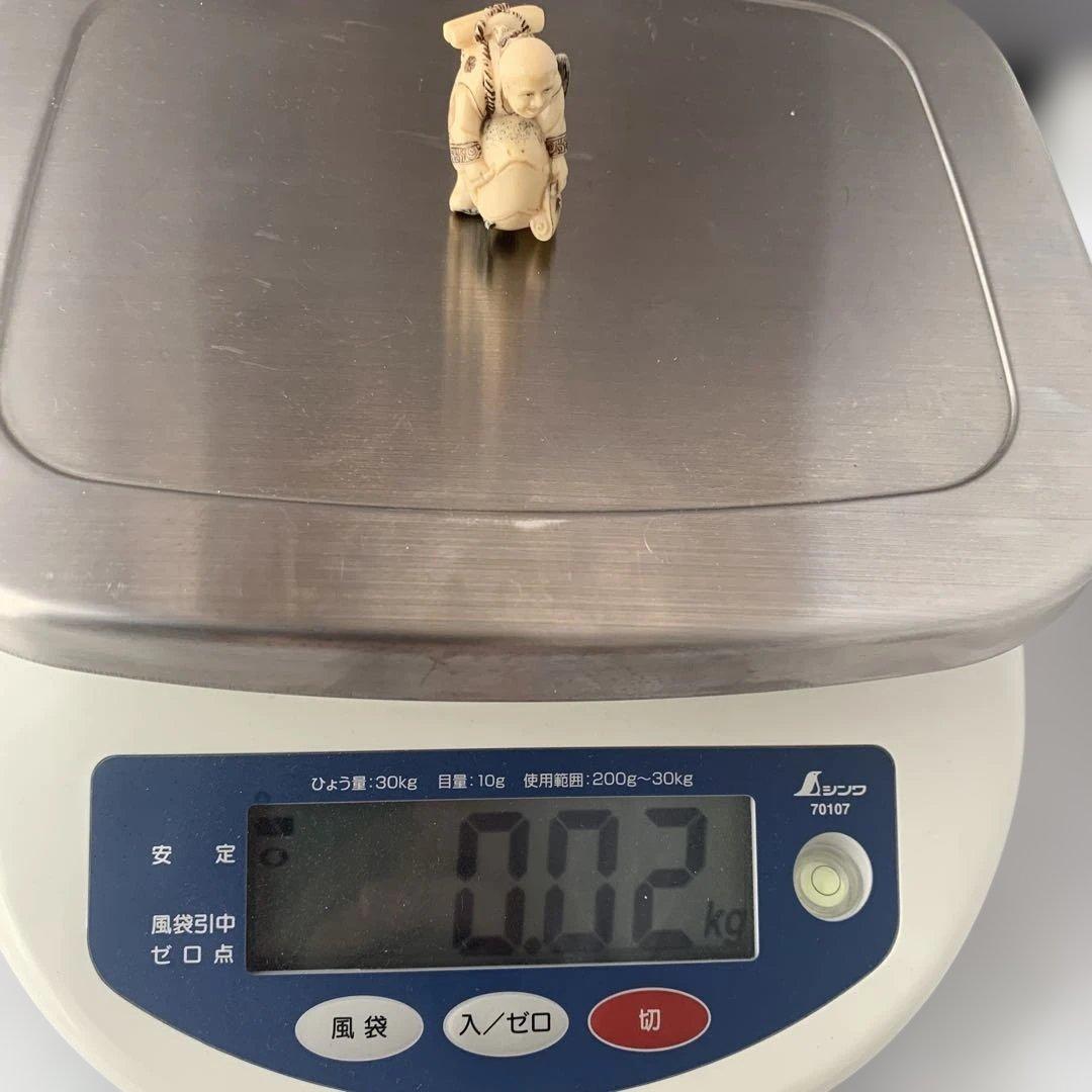 時代物 置物 魚にまたがる人物