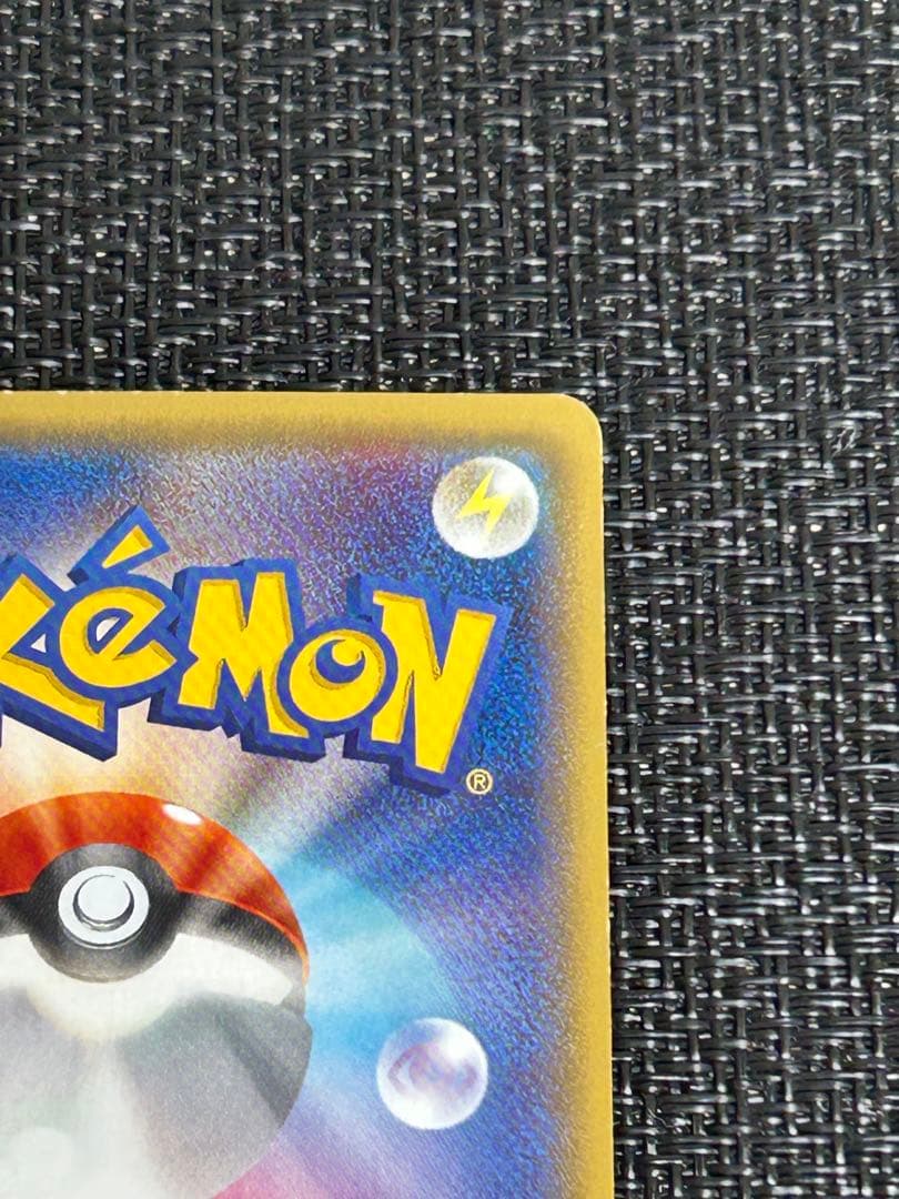 リザードンEX：ユニクロ「ポケモンカードゲームＴシャツ」 PROMO XY ①