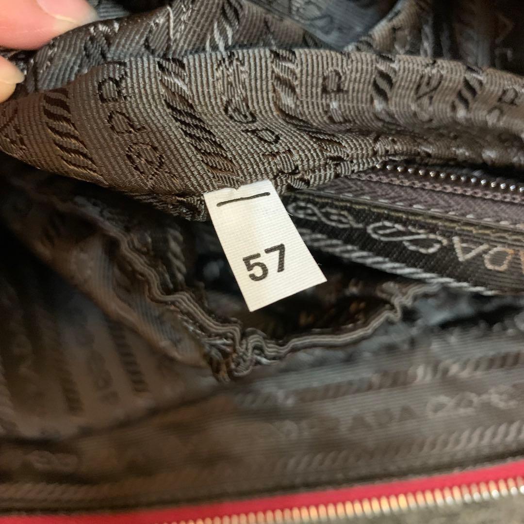 プラダ　PRADA トラベルバッグ　旅行用　スーツケース　赤　レッド　プレート