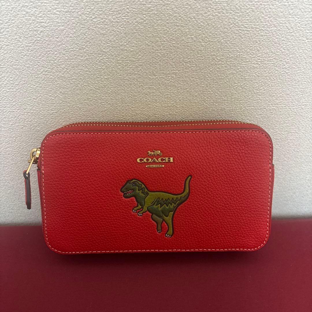 COACH レッド恐竜刺繍ポーチ