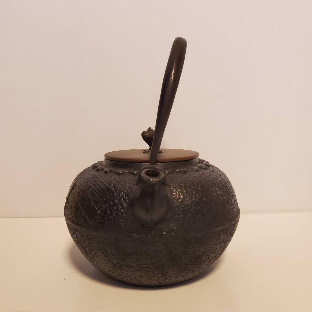 龍文堂　鉄瓶　古銭文様　取手銀象篏