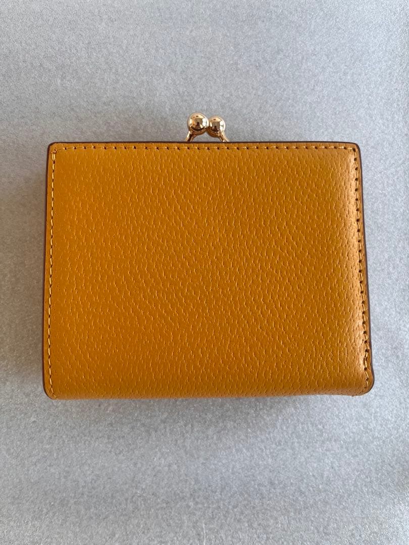 新品未使用品 Vivienne Westwood 二つ折り財布 イエロー