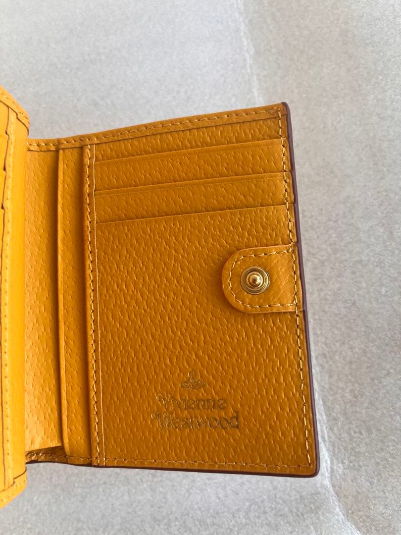 新品未使用品 Vivienne Westwood 二つ折り財布 イエロー