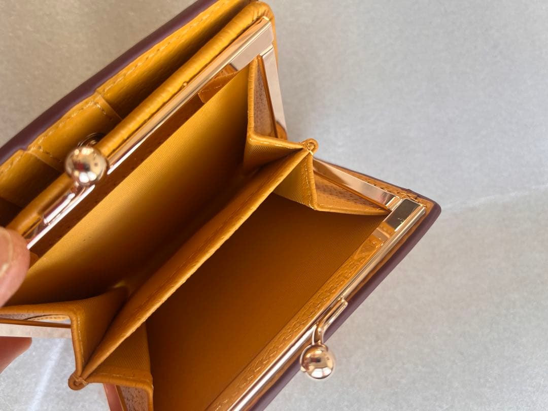 新品未使用品 Vivienne Westwood 二つ折り財布 イエロー