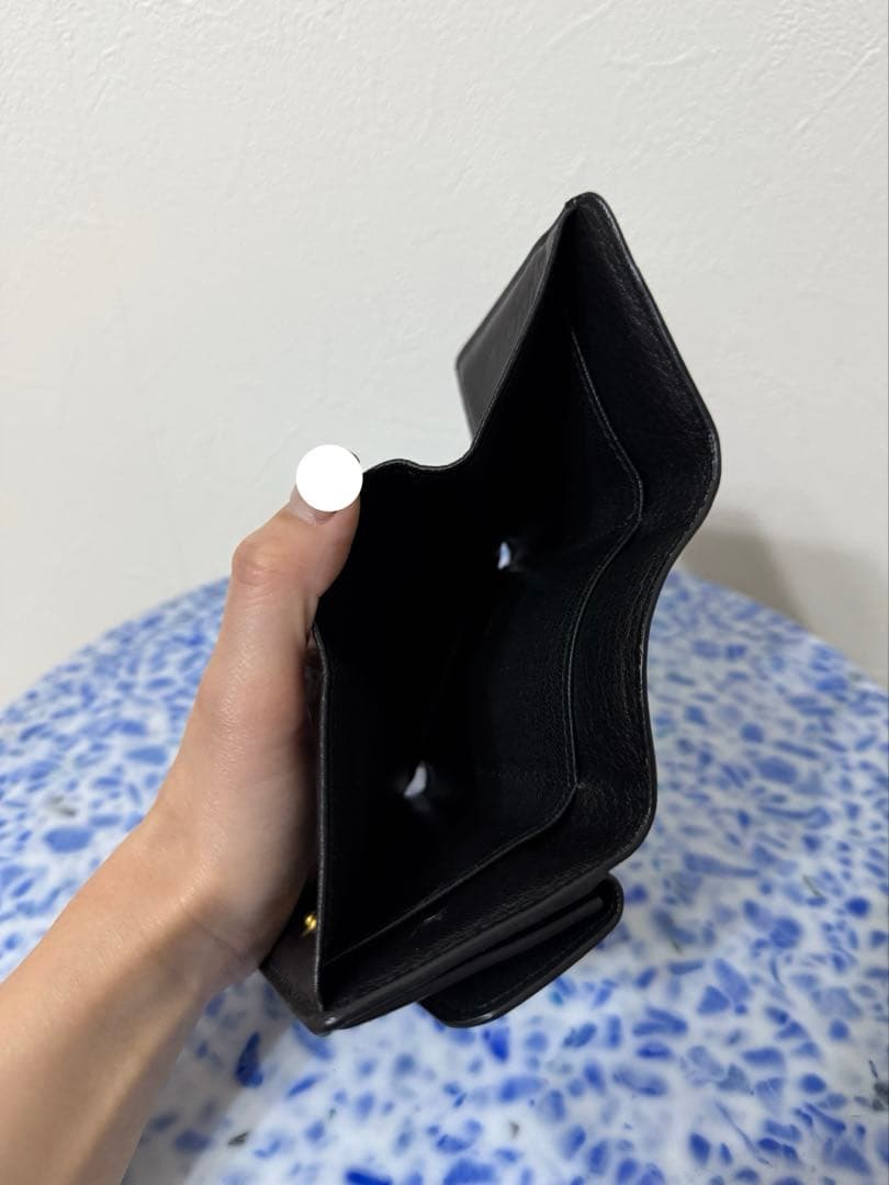 MIU MIUの三つ折り財布 ブラック 黒