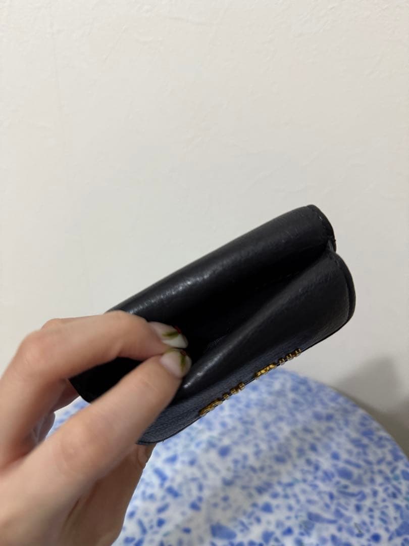 MIU MIUの三つ折り財布 ブラック 黒