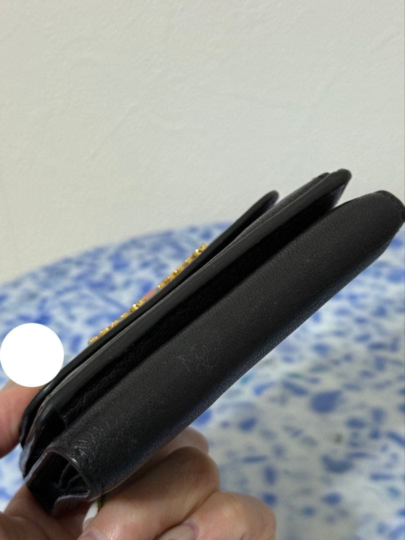 MIU MIUの三つ折り財布 ブラック 黒