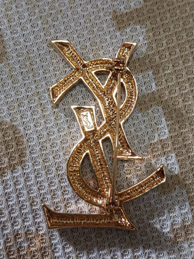 イブサンローラン　ゴールドブローチ