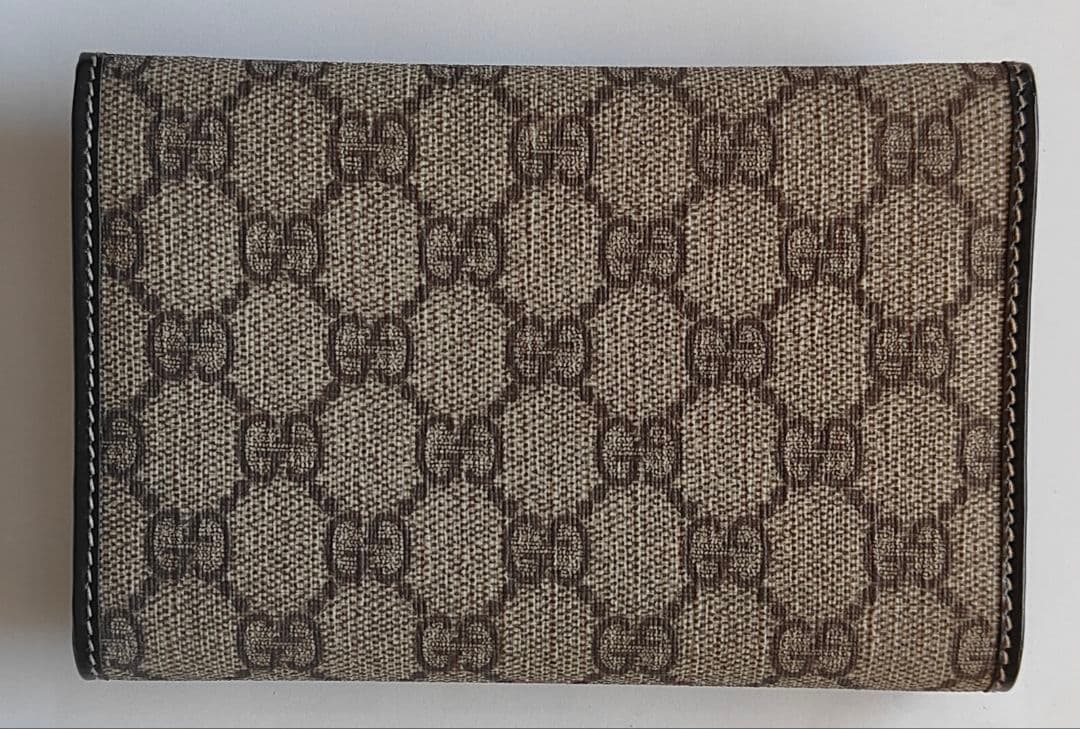 mon【未使用】GUCCI 二つ折り財布 GG柄 PVC ブラウン