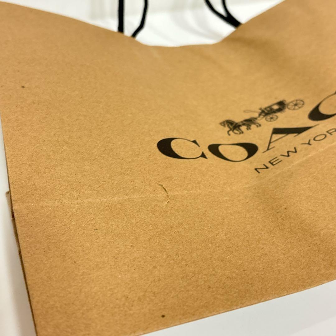 ✨新品未使用✨COACH コーチ 二つ折り 財布 ブラウン