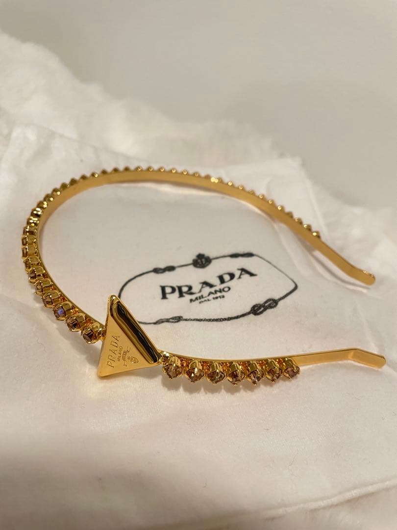 PRADA ゴールド ストーン付きヘアバンド カチューシャ
