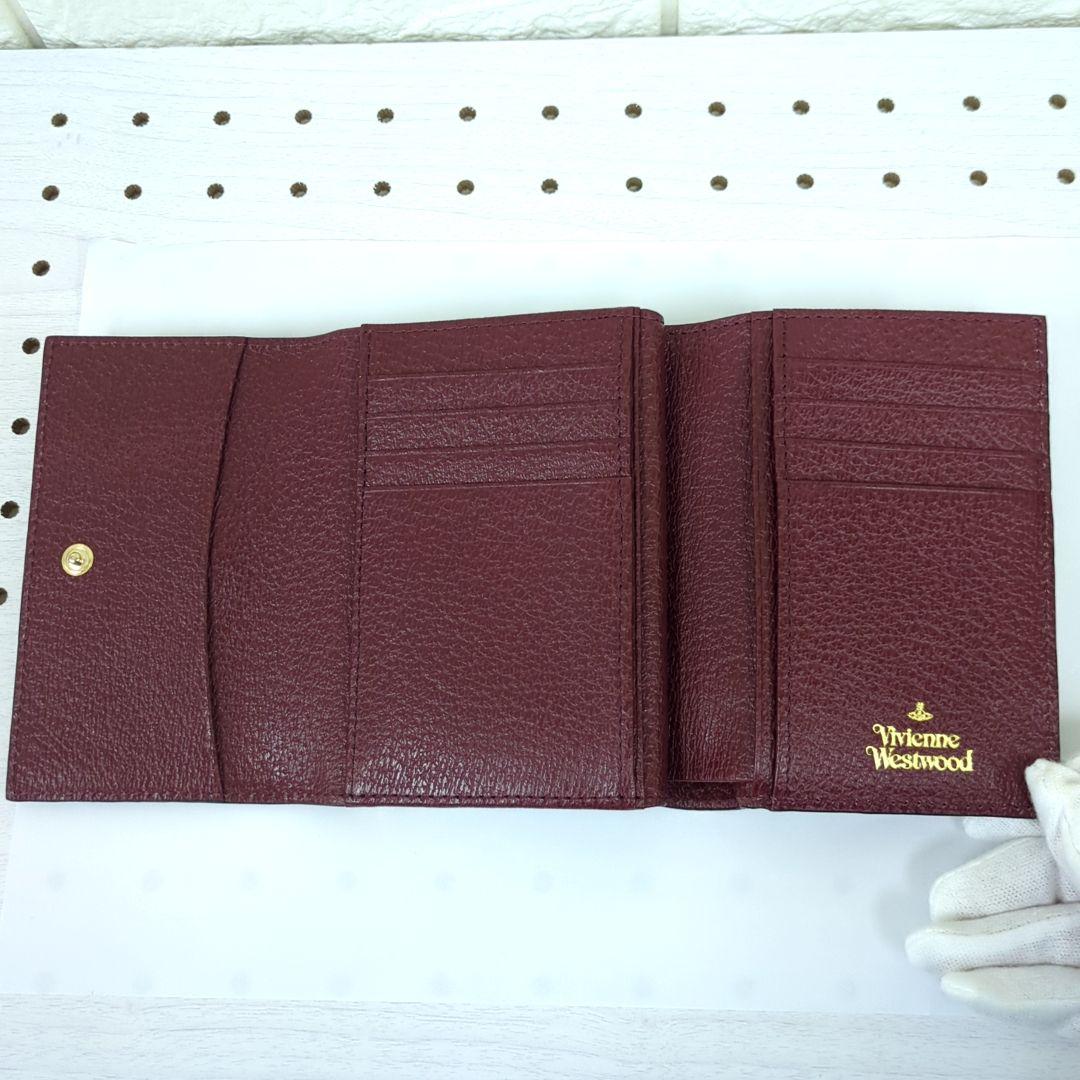 ヴィヴィアンウエストウッド/三つ折り財布/がま口タイプ/ワインレッド系　「美品」