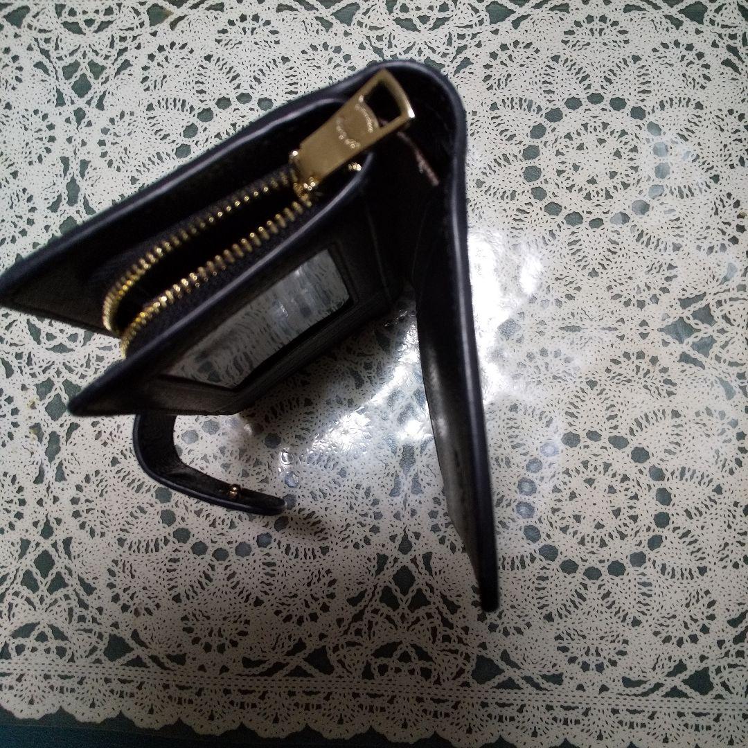 正規品❗️COACHブラックレザー 二つ折り財布 ❣️美品。ゴールドロゴ