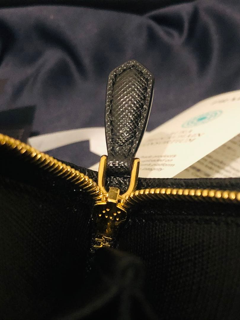 PRADA 二つ折り財布 サフィアーノレザー(ICチップ(RFID)搭載)