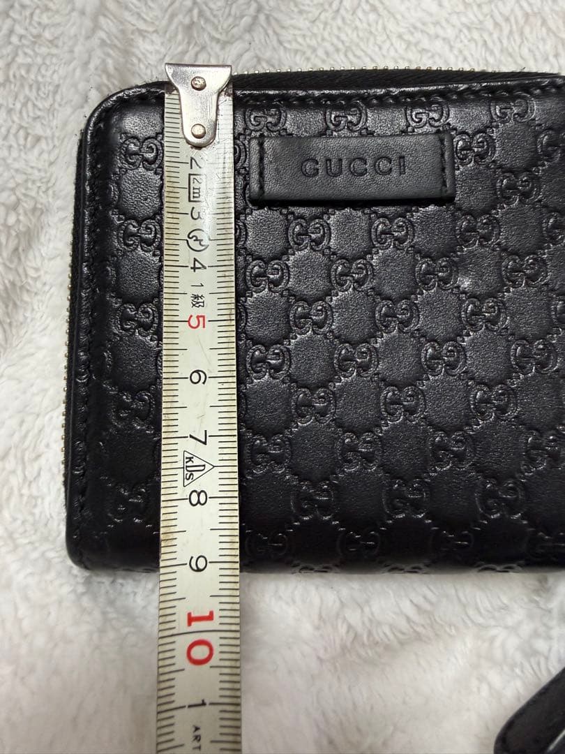 未使用GUCCI 二つ折り財布 ロゴプレート マイクロGG シマレザー 黒