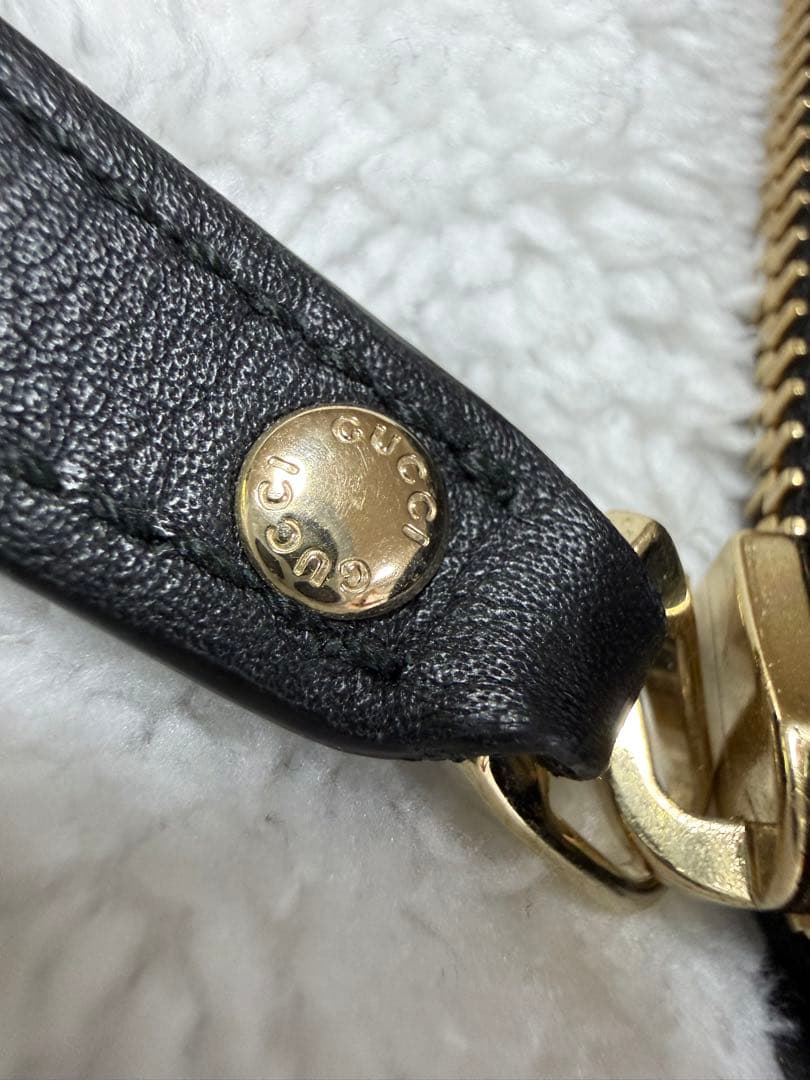 未使用GUCCI 二つ折り財布 ロゴプレート マイクロGG シマレザー 黒