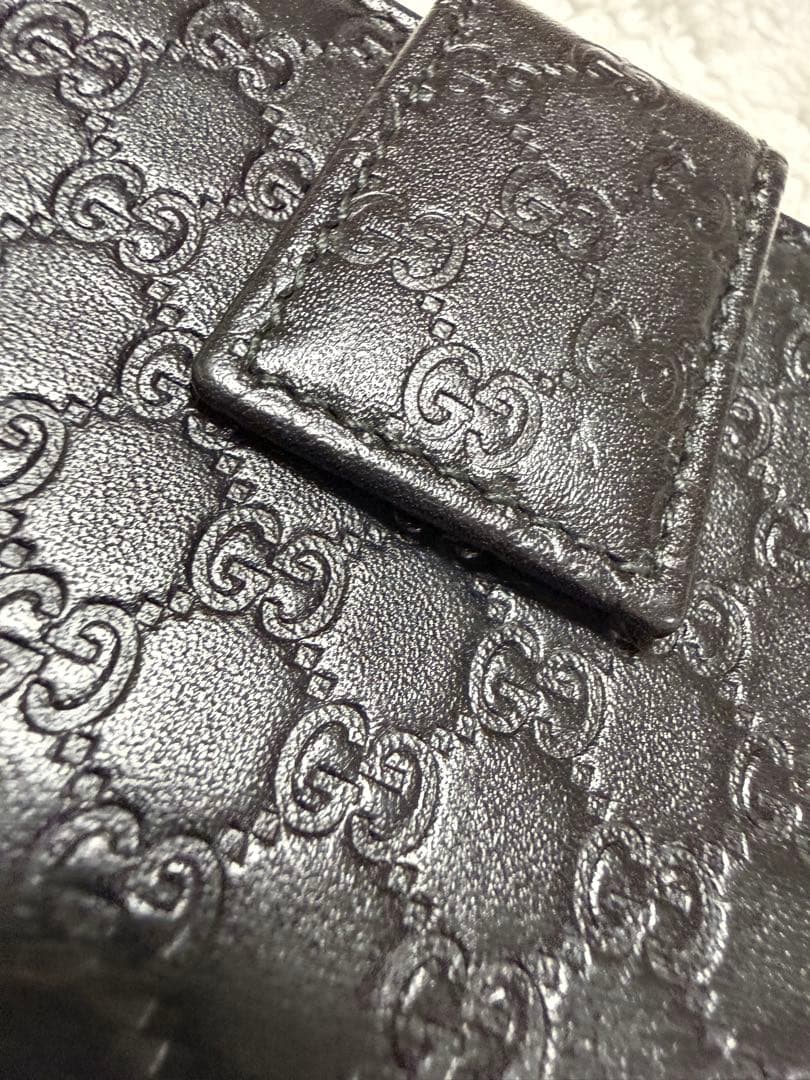 未使用GUCCI 二つ折り財布 ロゴプレート マイクロGG シマレザー 黒