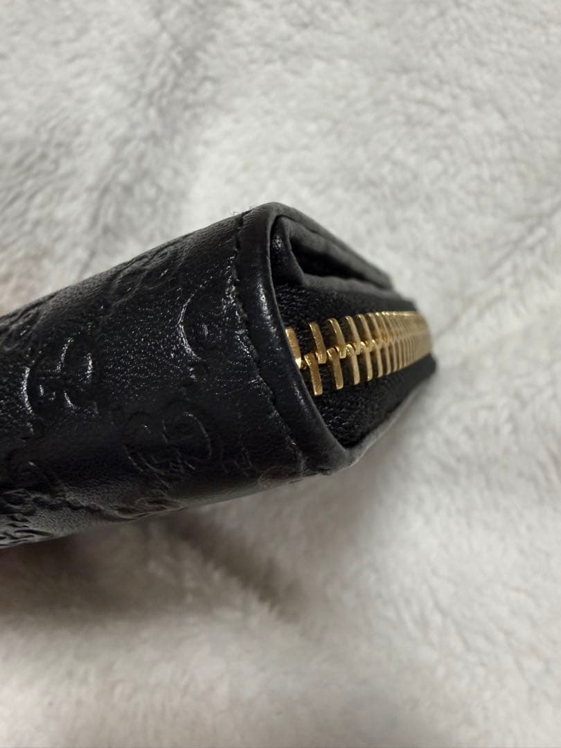 未使用GUCCI 二つ折り財布 ロゴプレート マイクロGG シマレザー 黒