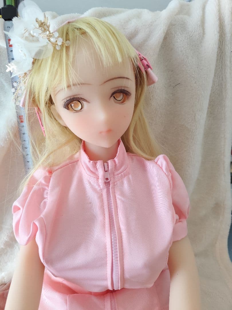 シリコンドール、花のヘアアクセサリーとローション1個お付けします。