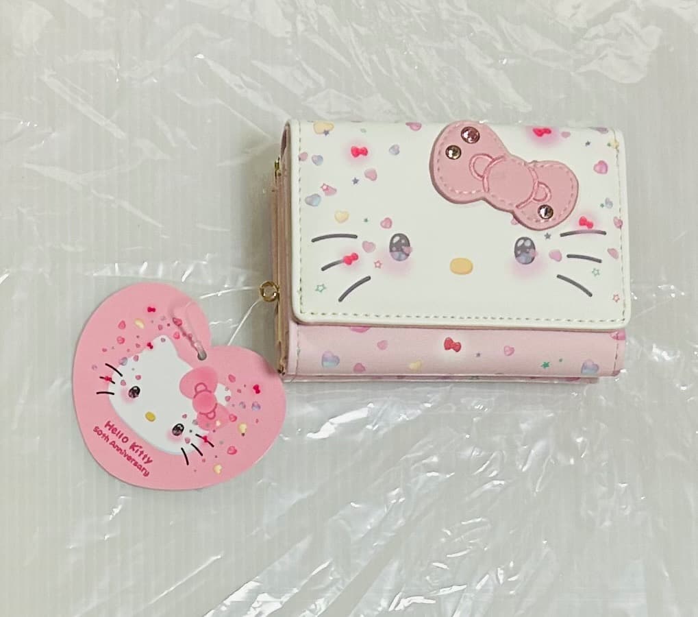 キティ50周年折り財布／　マイメロディ白いちごのティータイム　フェイス型ポーチ