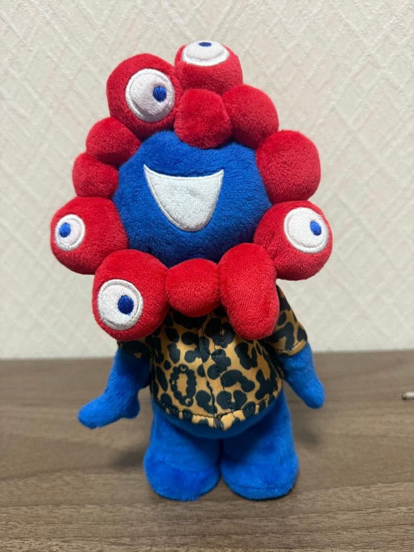 ミャクミャク　ポキポキぬいぐるみ　ヒョウ柄服付き