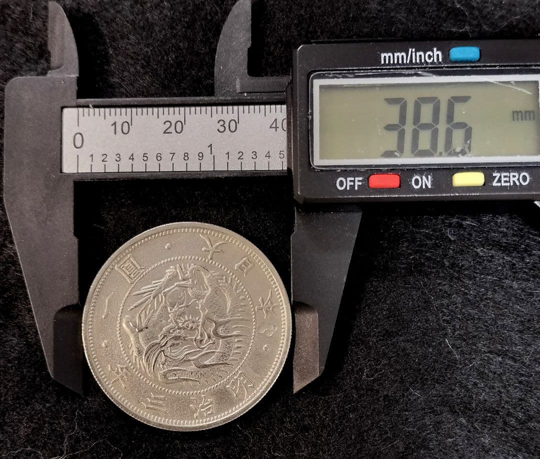 ひ*ん様 旧一円銀貨明治3年 目方約27g 銀含有率約90% 一圓銀貨古銭