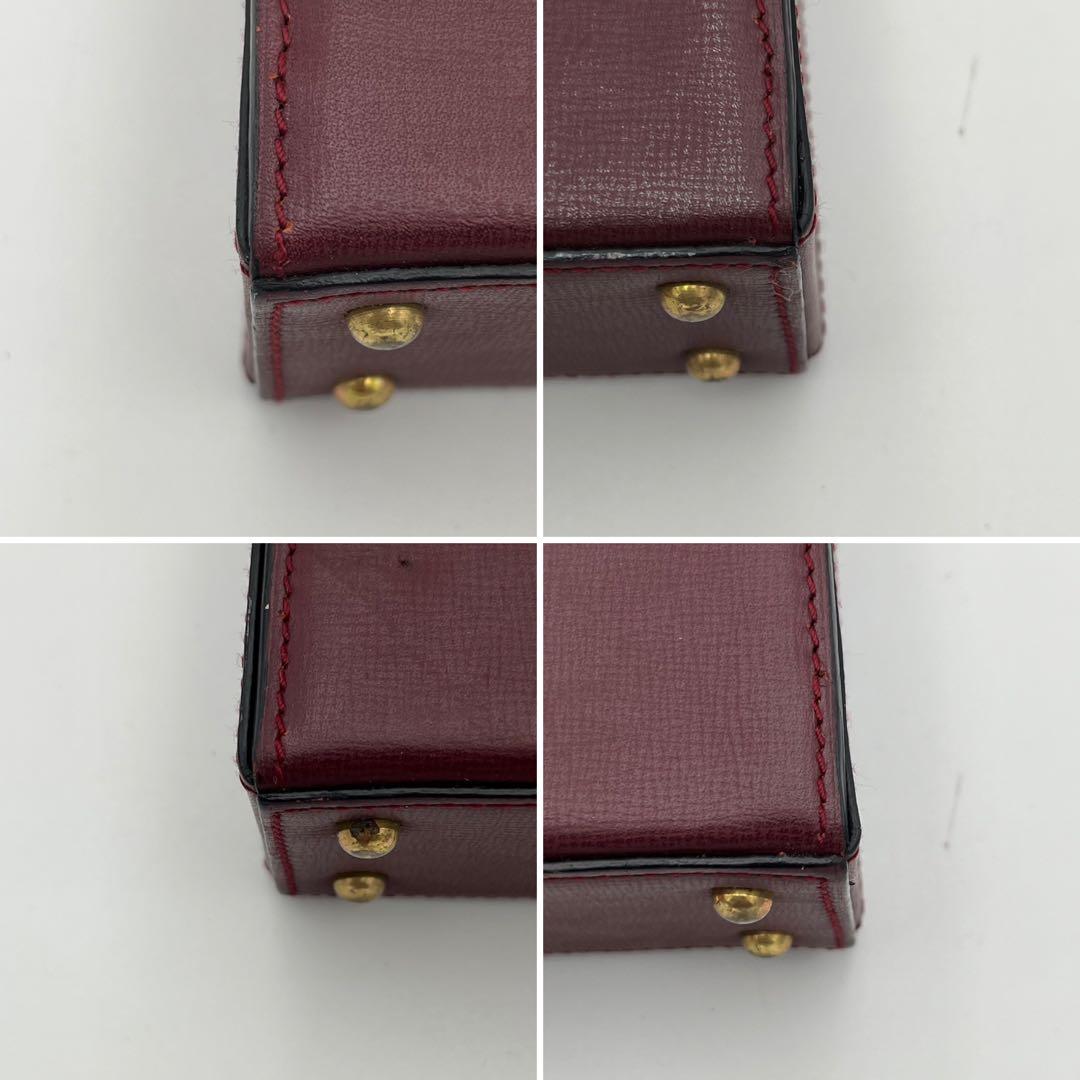 カルテイェ マストライン ターンロック ボックスカーフ ミニハンドバッグ 総柄