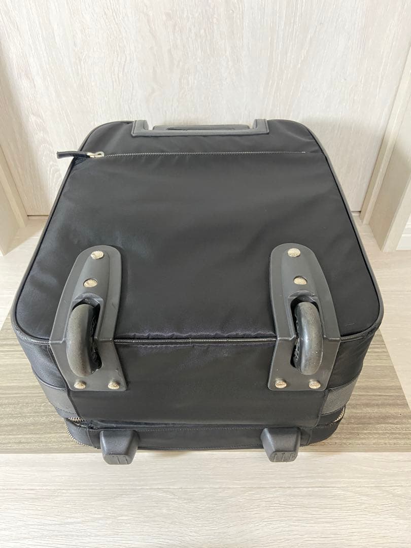 PRADA スーツケース　キャリーケース　ナイロン　レザー　三角ロゴプレート　黒
