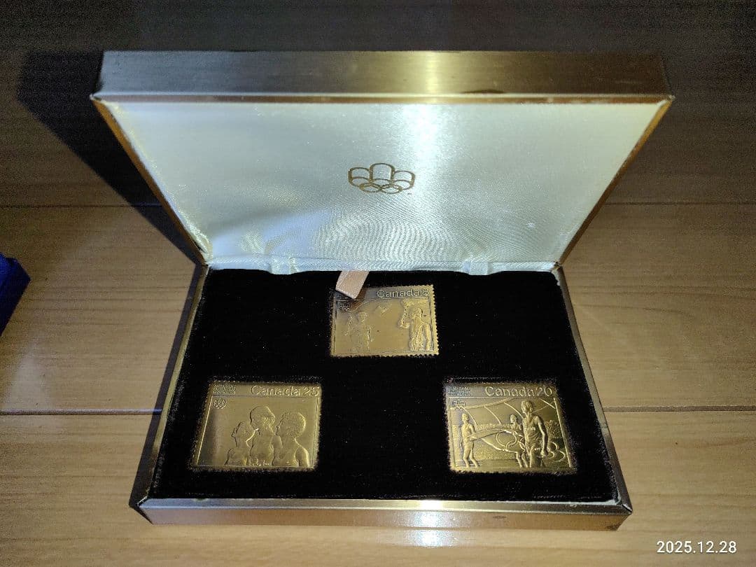 ●計2品①モントリオールオリンピック記念切手型硬貨②アメリカ合衆国リバティ