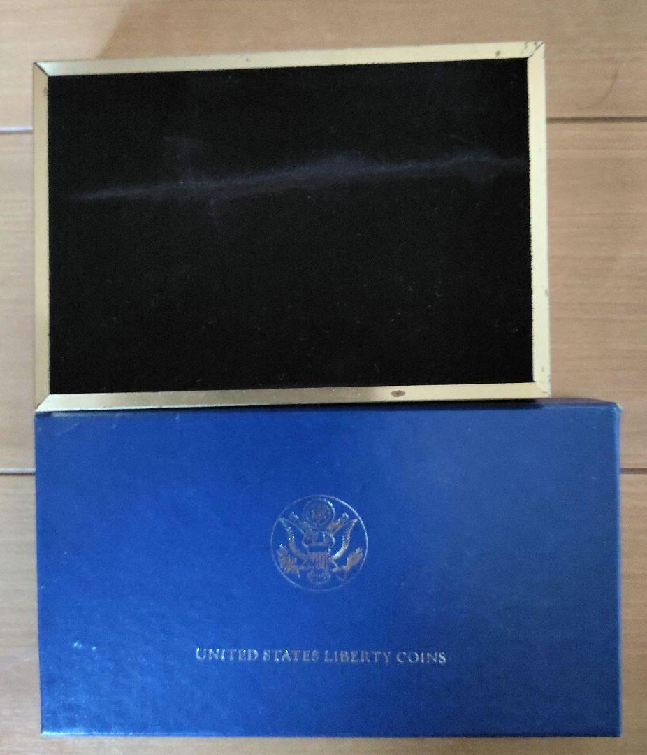 ●計2品①モントリオールオリンピック記念切手型硬貨②アメリカ合衆国リバティ