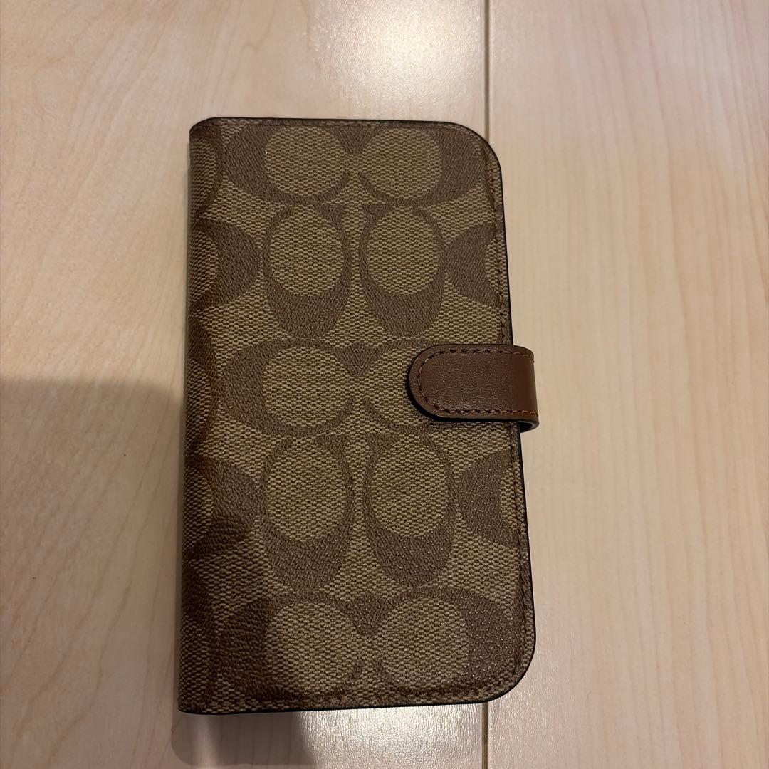 コーチiPhone15 PRO ケース シグネチャー 手帳型 スマホケース 収納