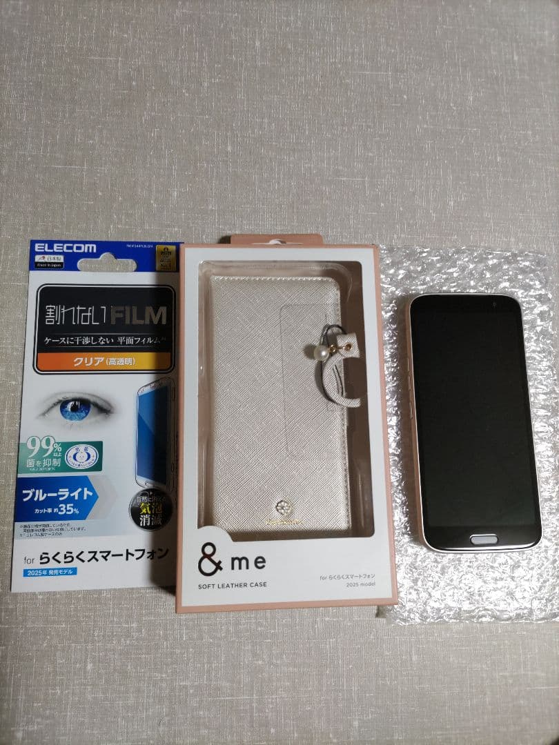 らくらくスマートフォン F-53E ゴールド 新品ケース、フィルム付き