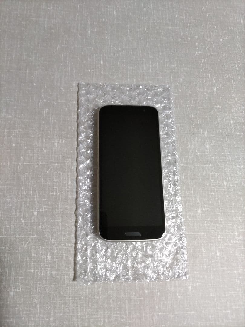 らくらくスマートフォン F-53E ゴールド 新品ケース、フィルム付き