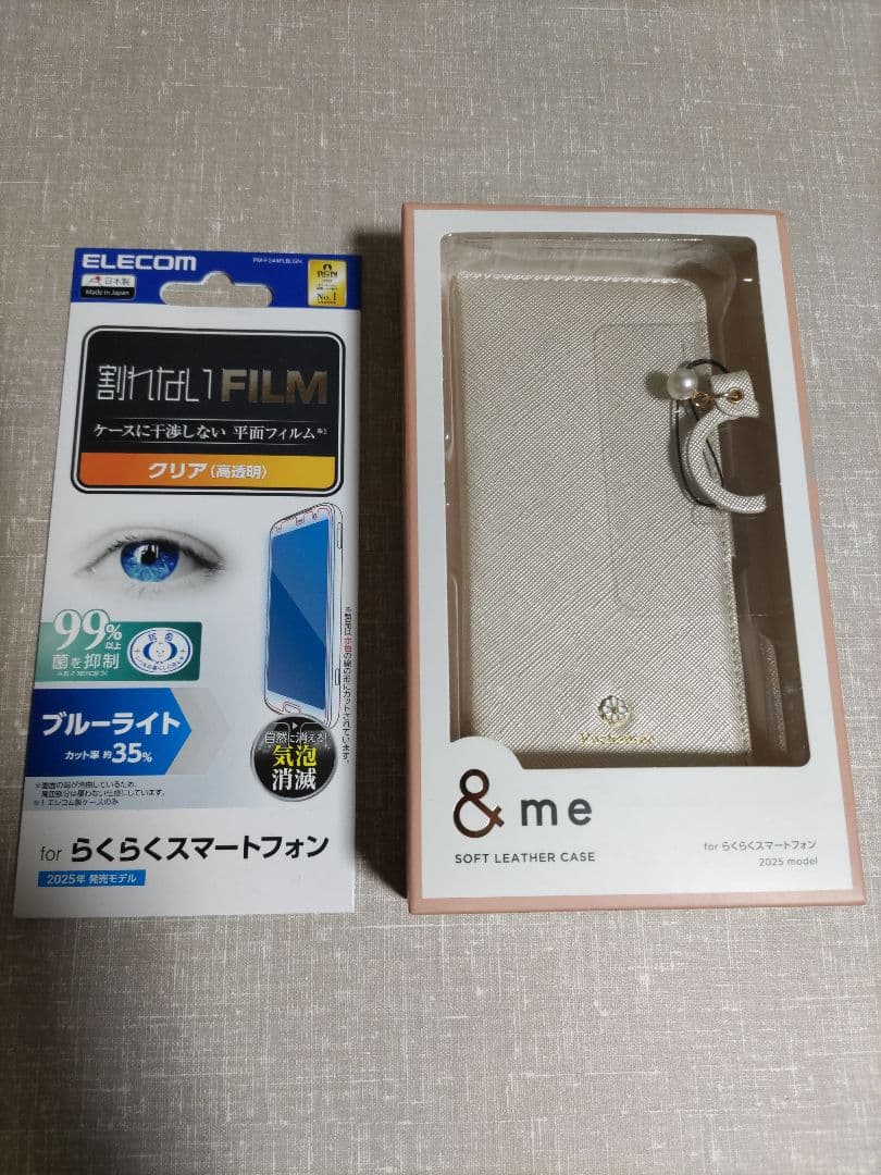 らくらくスマートフォン F-53E ゴールド 新品ケース、フィルム付き