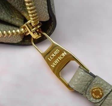 美品 M69794バイカラー 長財布 トゥルトレール クレーム