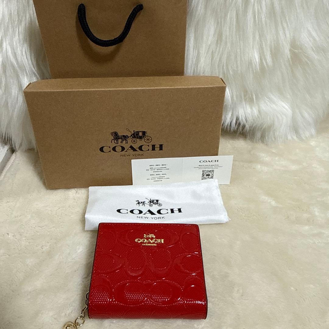 COACH 赤 エナメル 二つ折り財布