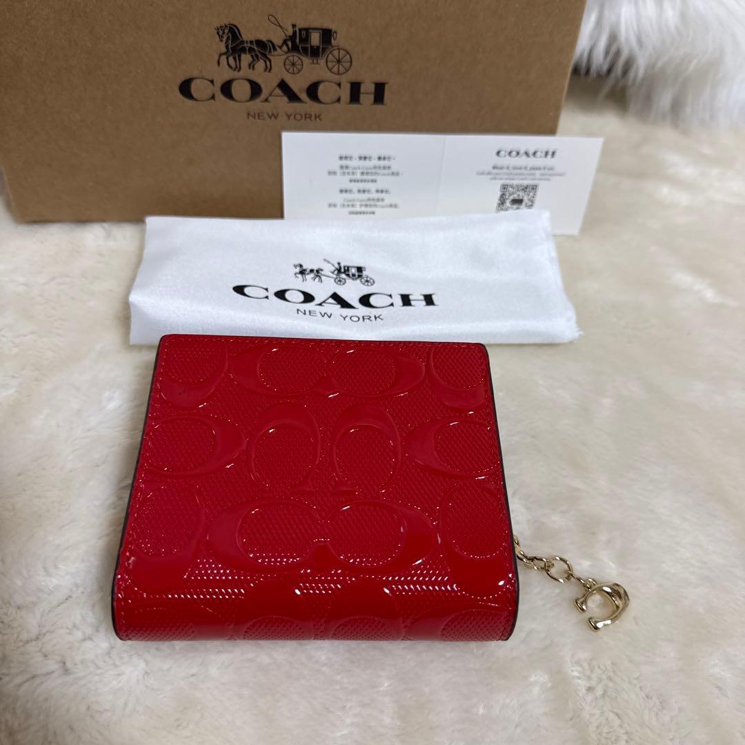 COACH 赤 エナメル 二つ折り財布