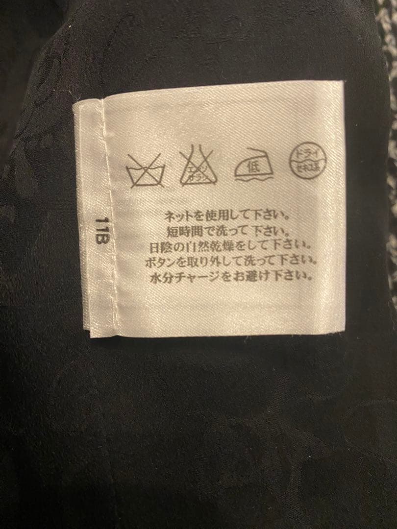 CHANEL モノトーン　ツイード　コート　ジャケット　ライオンCOCOボタン